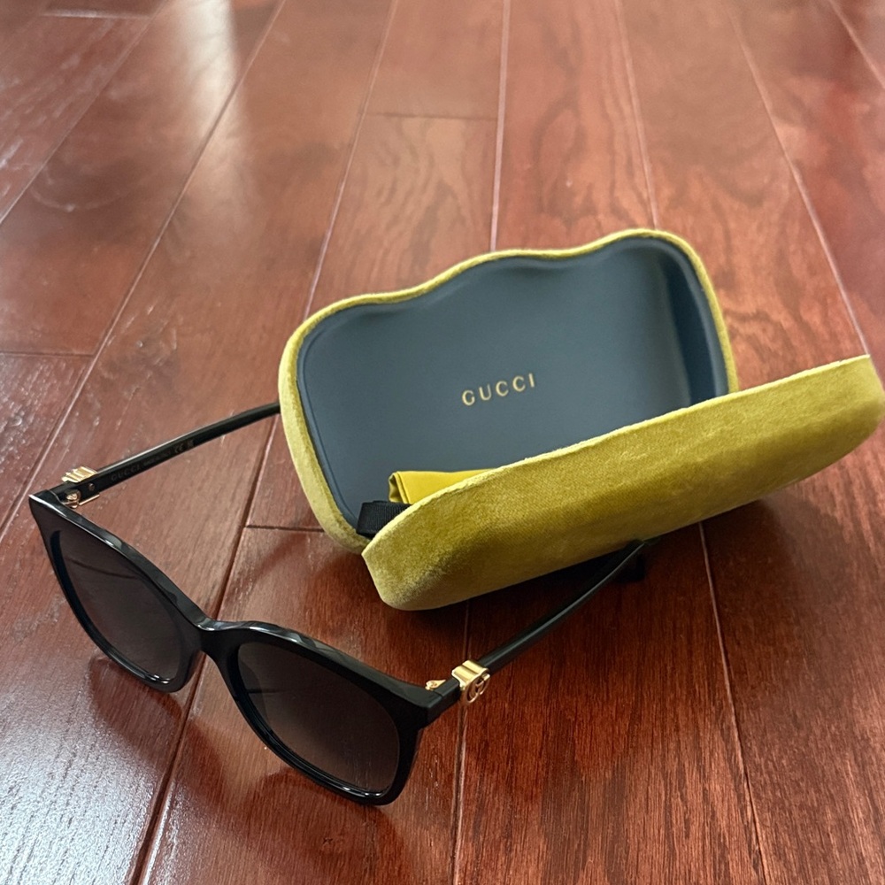 Gucci Black Sunglasses with Gold Details